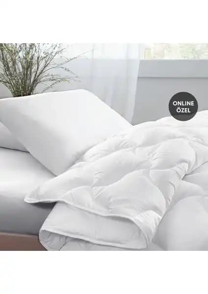 Yataş Bedding Tek Kişilik Eco Night ve Macaron Wellsoft Yorgan Karşılaştırması 1