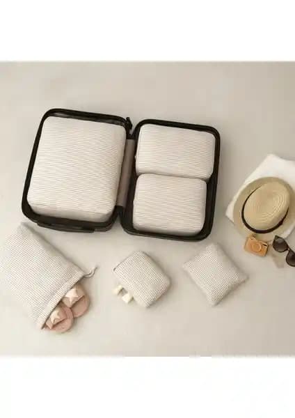 Nacarev 6'lı Krem Renkli Çizgi Desenli Valiz İçi Düzenleyici Seti - Pratik ve Dayanıklı Seyahat Aksesuarı