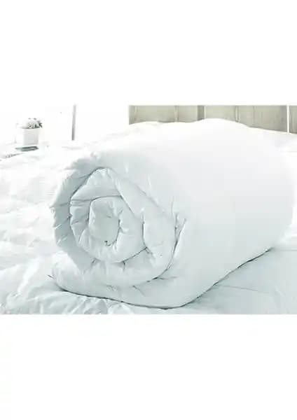 Taç Microfiber Yorgan Tek Kişilik: Konfor ve Sıcaklık Sunan Kaliteli Uyku Aksesuarı