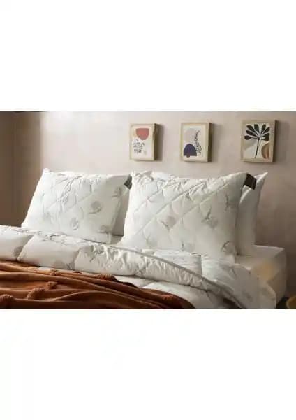 Duvetta Kapitone Kılıflı Yün Boncuk Yastık: Doğal ve Konforlu Uyku Deneyimi Sağlar