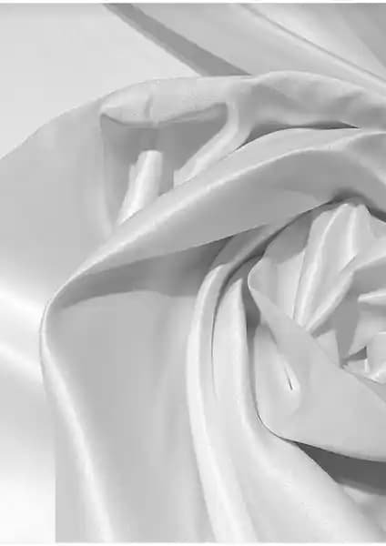 Taç Saten Güneşlik Perde: Estetik ve Dayanıklı İç Mekan Güneş Kontrolü Çözümü