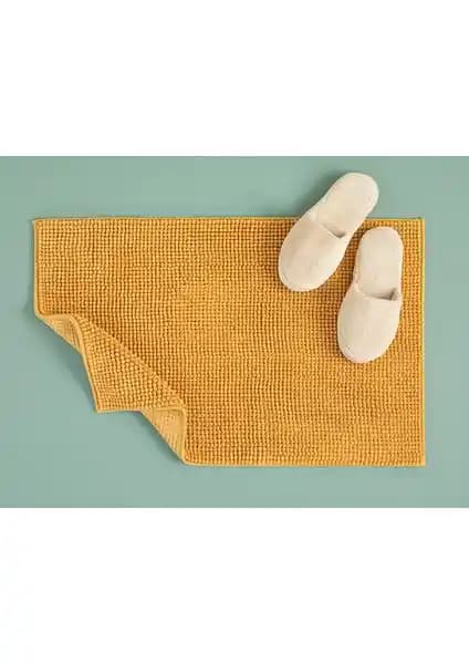 Banyo Paspası Karşılaştırması: Polyester ve Pofuduk Modellerin Özellikleri ve Kullanım Avantajları