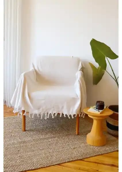 Koza Mix Tekli Koltuk Örtüsü Krem: Şıklık ve Dayanıklılığı Bir Arada Sunan Modern Tasarım