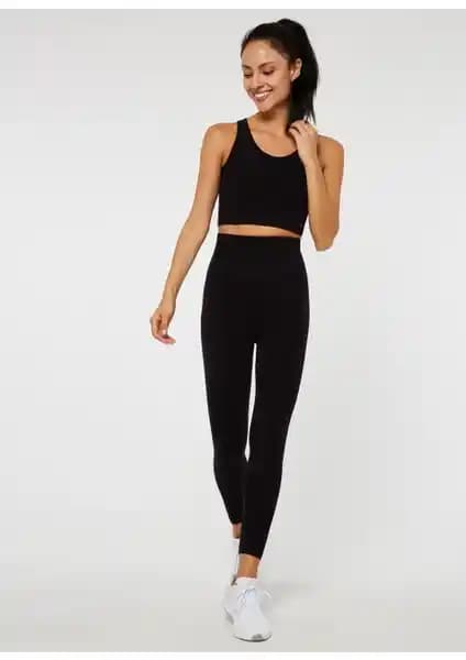 Jerf Luz Kemeri Rip Detaylı Yüksek Bel Tayt: Şıklık ve Konfor Sunan Kadın Taytları